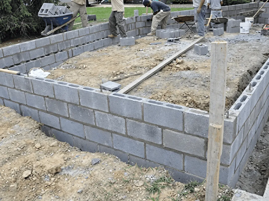 Professionals building a foundation with blocks in Anchorage, AK